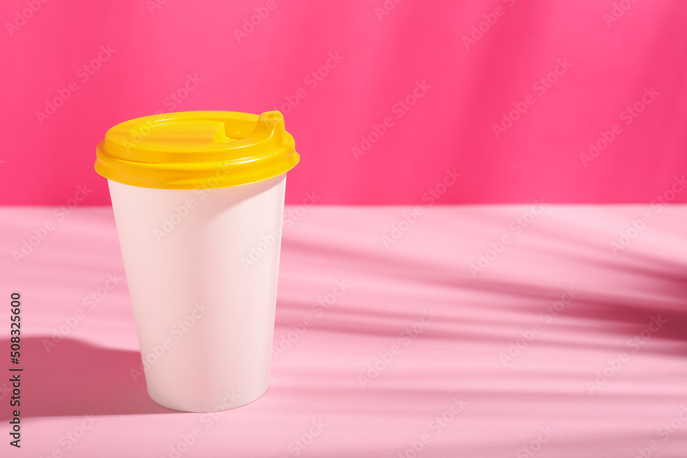 Takeaway paper cup on color background Takeaway paper cup on color background