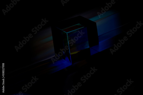 Abstract black background with glowing neon lines.