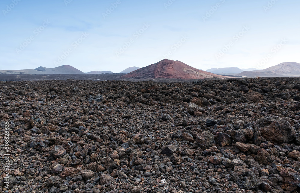 Landscape of a sea of volcanic lava in Lanzarote, Canary Islands, Spain