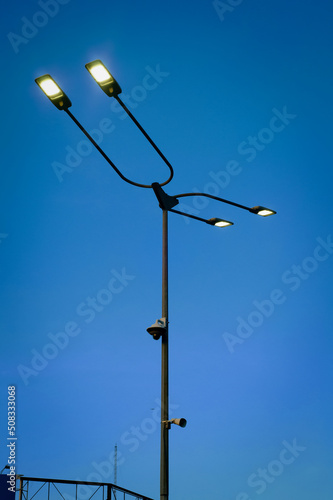 Street lamp on blue sky