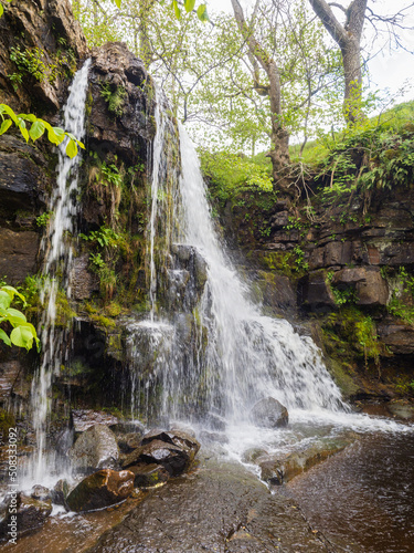 On the Coast to Coast long distance footpath walk at Muker in Swaledale in the Yorkshire Dales