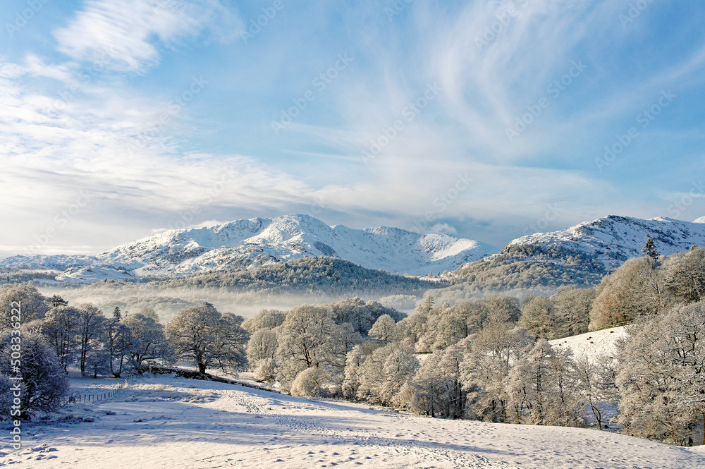 Lake District National Park, Cumbria, England, UK. Winter landscape. S.W. over Langdale to Wetherlam mountain from Loughrigg