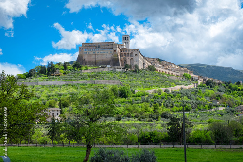 Panorama of Assisi (Italy, Umbria region), taken from the surrounding countryside. Ancient medieval city, is world famous as birthplace of St. Francis, Italy's christian Patron.