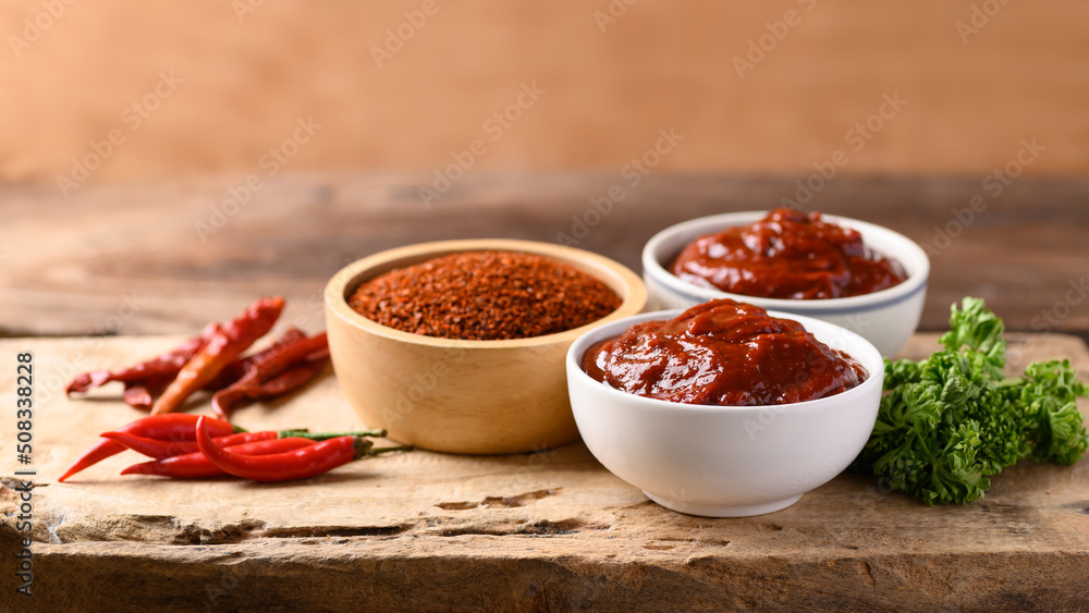 Korean gochujang (red chili paste), spicy and sweet fermented condiment in Korean food - obrazy, fototapety, plakaty 