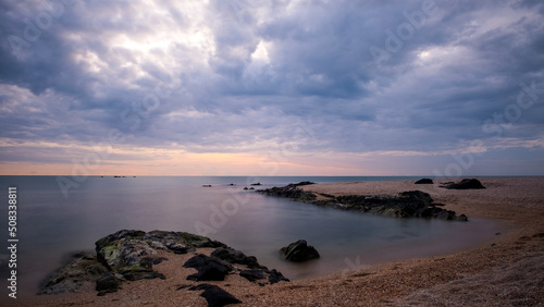 View of a rocky coast during sunset. Long exposure shot.sea beach landscape