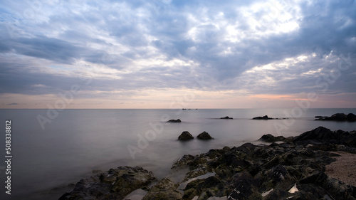 View of a rocky coast during sunset. Long exposure shot.sea beach landscape