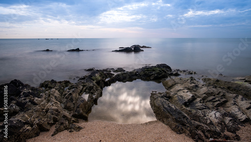 View of a rocky coast during sunset. Long exposure shot.sea beach landscape