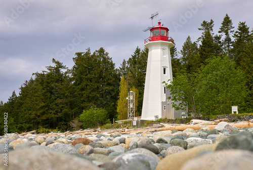 Quadra Island Cape Mudge Lighthouse BC. The historic Cape Mudge Lighthouse on Quadra Island overlooking Discovery Passage and Campbell River. BC, Canada.

 photo