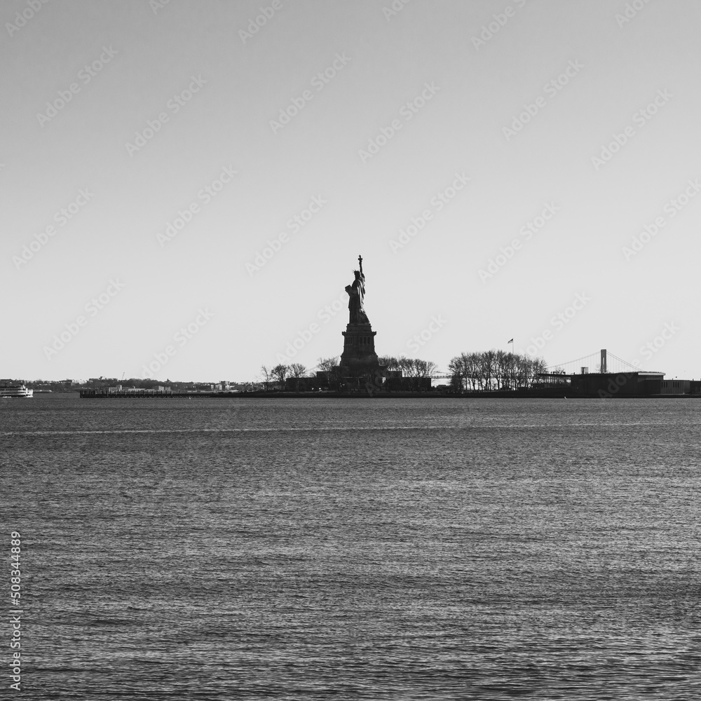 Jersey City, New Jersey, USA - December 22 2021: Statue of Liberty. View from Statue of Liberty State Park. Black and white.
