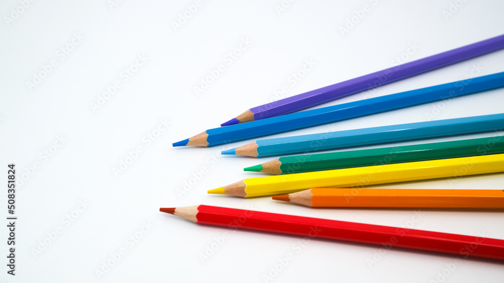 Many different colored pencils on white background Many different colored pencils on white background