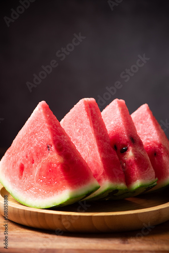 fresh sliced watermelon fruit on wooden  background