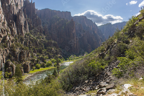 A dramatic view of the river and inner canyon walls from Black Canyon of the Gunnison National Park in Colorado