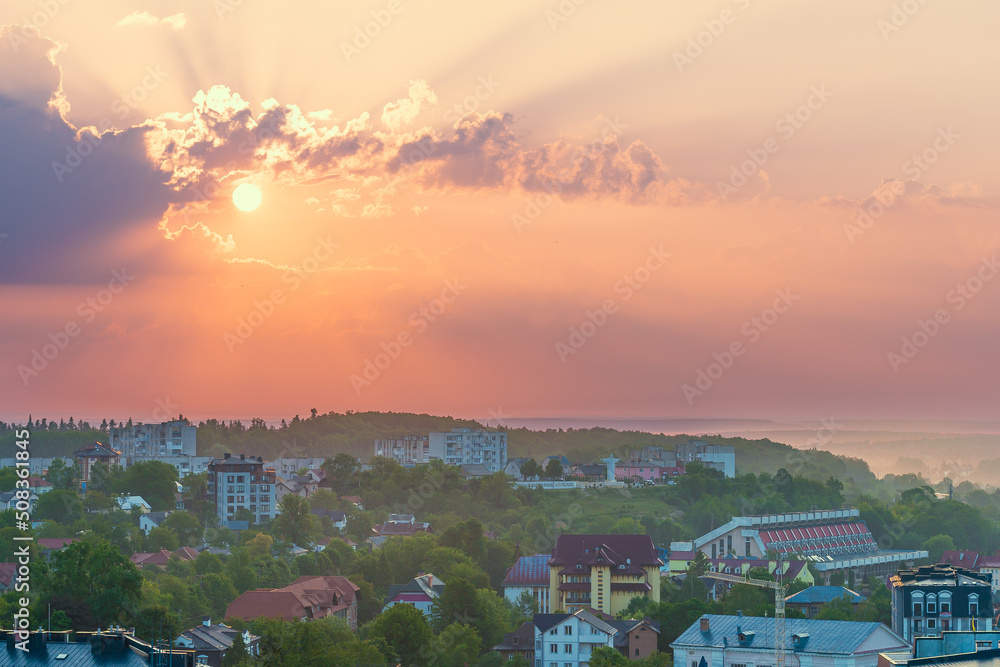 One of the architectural monuments is the Statue of Christ the Savior in Truskavets on Lesya Ukrainka street on the Hoshiv Hill. Sunrays. Truskavets, Ukraine. Early morning sunrise.