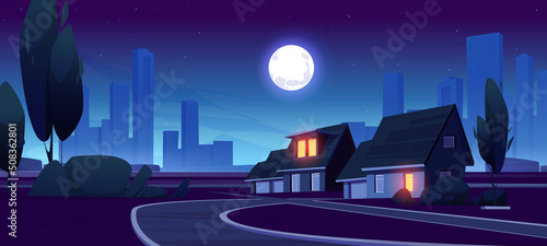 Fotografia Night suburb district with houses, road and city buildings on skyline in dusk