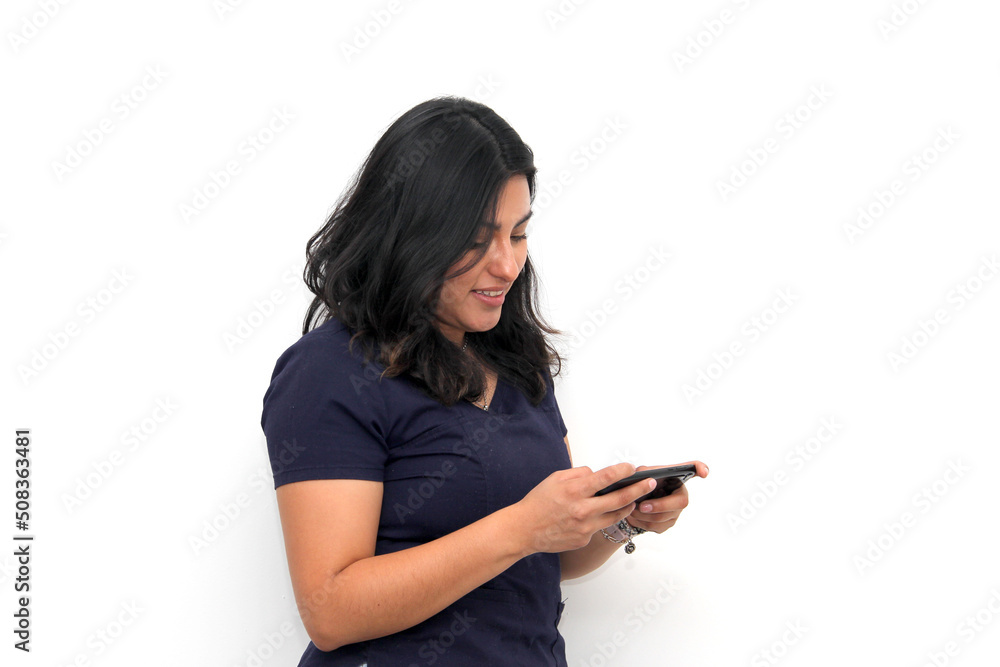 Latin young adult woman enjoys her cell phone to play video games, watch series and movies, uses technology for fun and entertainment
Latin young adult woman enjoys her cell phone to play video games, watch series and movies, uses technology for fun and entertainment