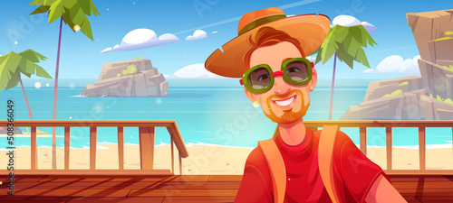 Happy man on bungalow wooden porch on sand sea beach with palm trees and mountains. Vector cartoon illustration of male character in sunglasses and hat on summer tropical ocean shore