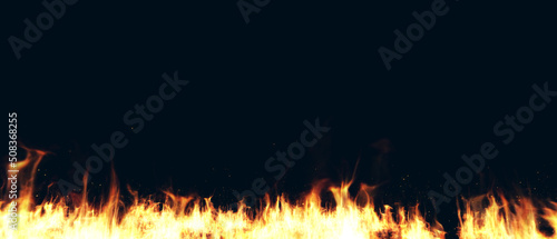 Fire flames and sparks background. Fire flames isolated on black background. 