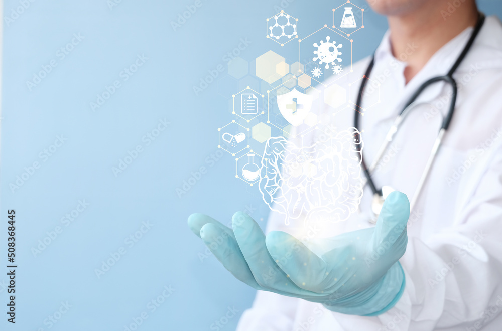 Doctor holding a virtual Intestine in his hand. Human organ drawn by hand, healthcare hospital service concept, holographic bowel scan projection with vital signs. Doctor holding a virtual Intestine in his hand. Human organ drawn by hand, healthcare hospital service concept, holographic bowel scan projection with vital signs.