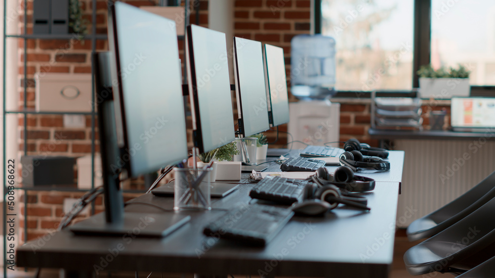 Nobody in empty call center workstation with computers and audio  instruments. No people at customer service office desks with  telecommunications technology, offering helpline assistance. Stock-Foto |  Adobe Stock
