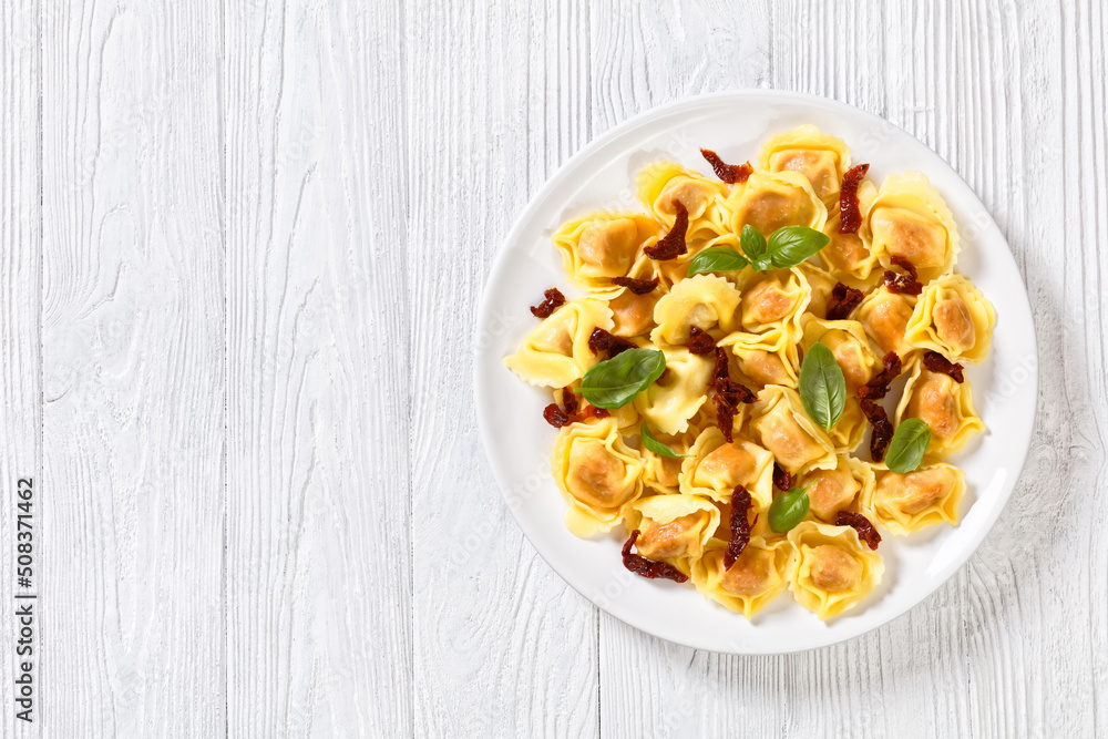 italian Tortelloni stuffed with sun dried tomatoes italian Tortelloni stuffed with sun dried tomatoes