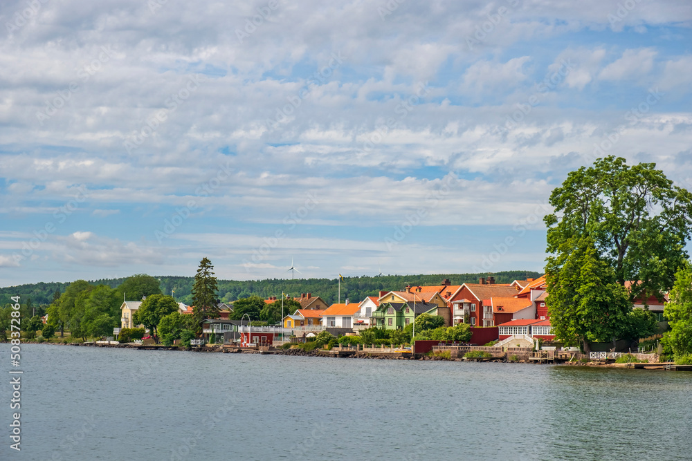 View of houses on the shore of Lake Vättern in the town of Hjo in Sweden