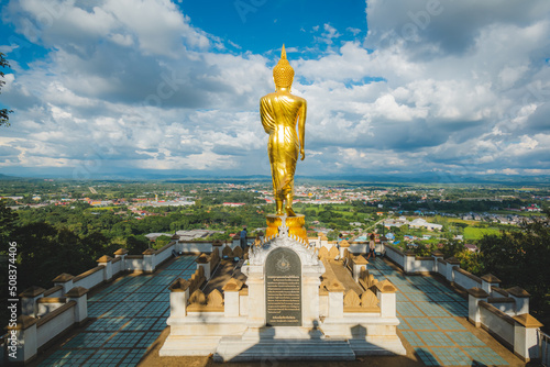 The Golden Buddha statue at Wat Phra That Khao Noi  or Phrathat Khao Noi temple  is the top attraction with a fantastic view of Nan province  Thailand