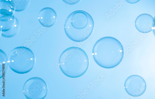 Abstract Beautiful Transparent Blue Soap Bubbles Background. Soap Sud Bubbles Water 