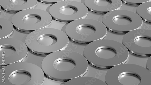 Hardware concept. Manyf washers or metal spacers. Shiny metal washers on a metal surface. Abstract industrial minimalistic background. 3d illustration