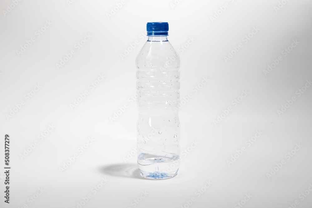 Empty mineral water bottle on white background Empty mineral water bottle on white background