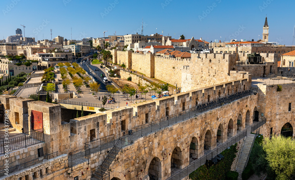 Walls of Tower Of David citadel and Old City over Jaffa Gate and Hativat Yerushalayim street with Mamilla quarter of Jerusalem in Israel