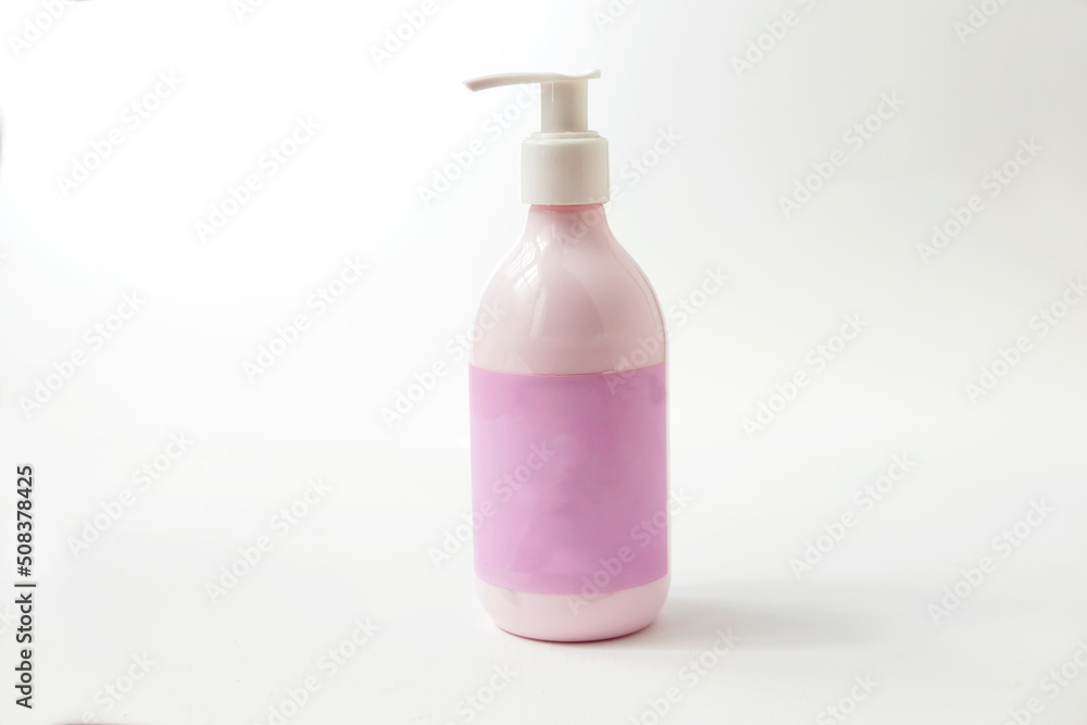 A pink lotion bottle isolated on white background A pink lotion bottle isolated on white background