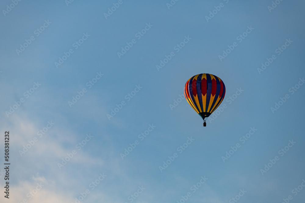 Hot air balloons floating in the air over the City of Burlington, WI Hot air balloons floating in the air over the City of Burlington, WI