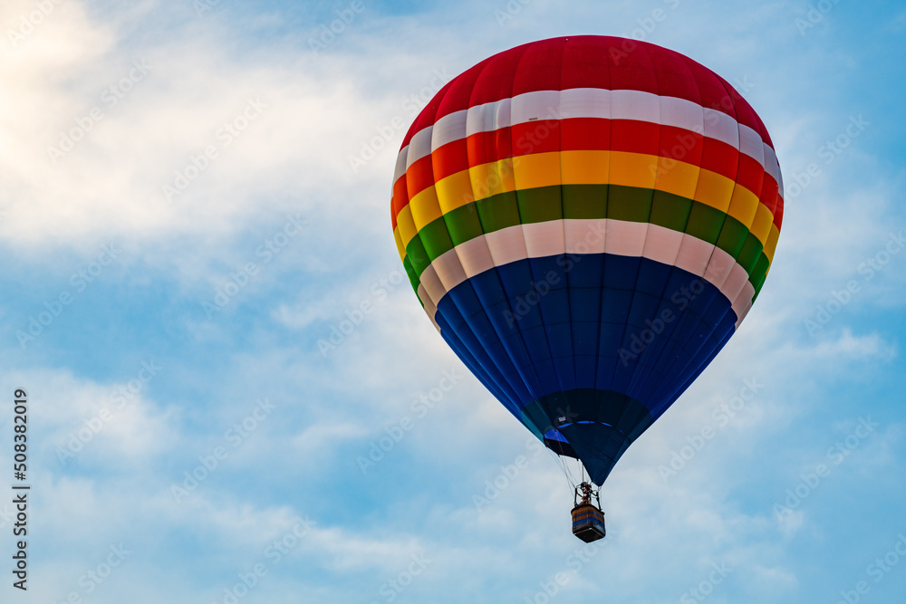 Naklejka premium Hot air balloons floating in the air over the City of Burlington, WI