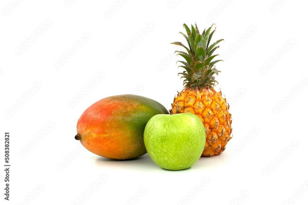 Mango, pineapple and apple isolated on a white Mango, pineapple and apple isolated on a white