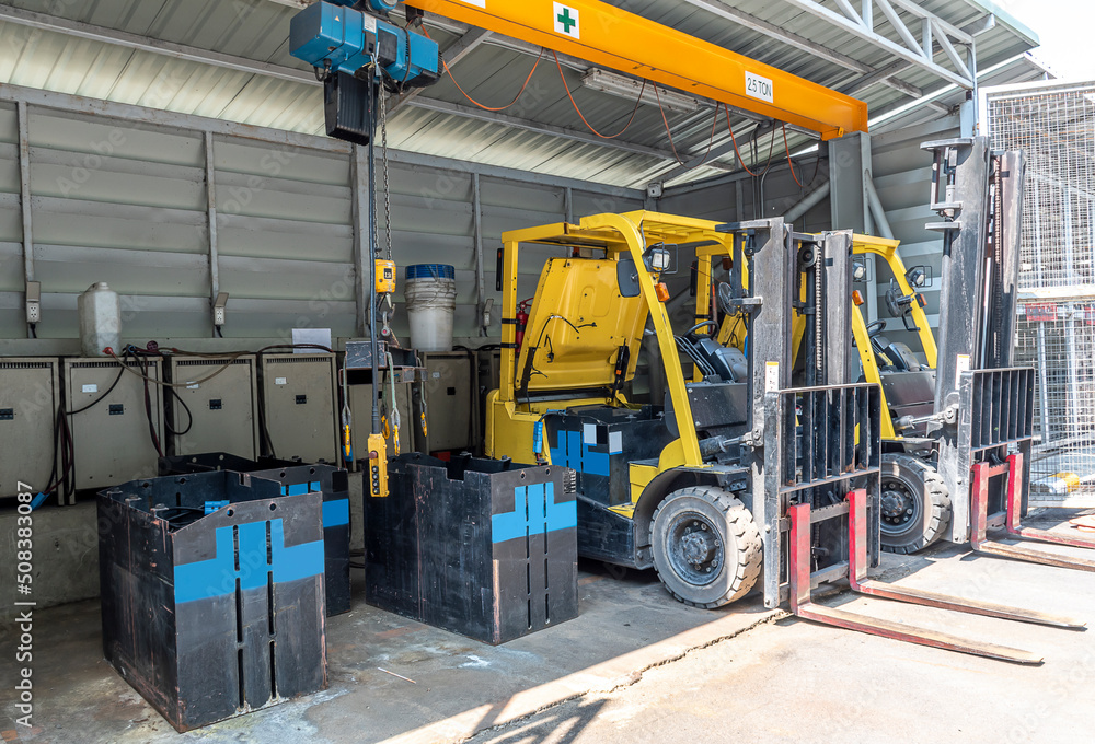 Forklifts parked to charge batteries