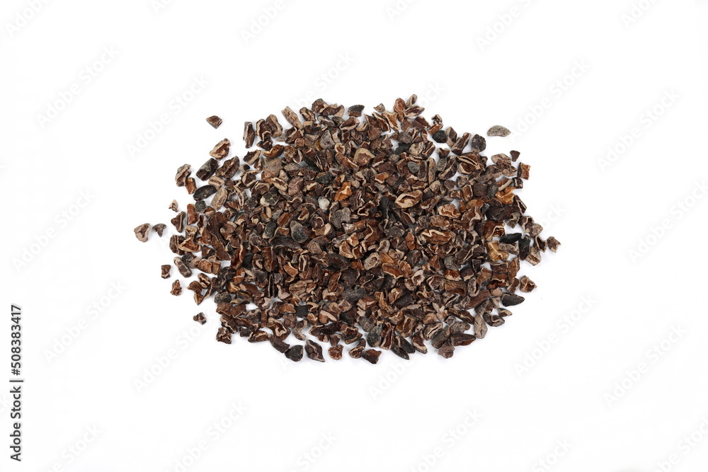 Cocoa nibs, a pieces of broken cocoa beans isolated, top view Cocoa nibs, a pieces of broken cocoa beans isolated, top view