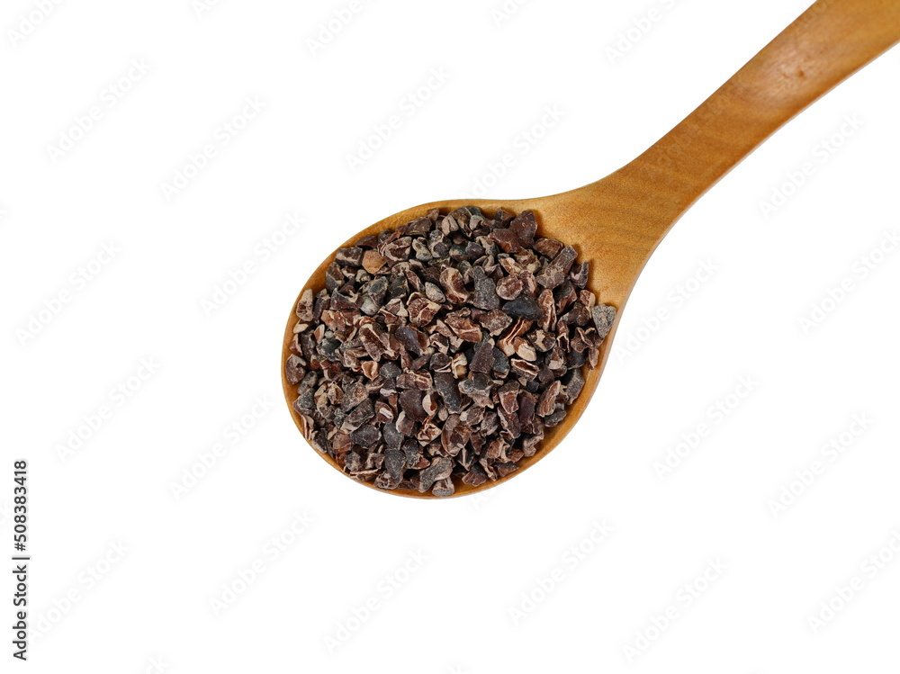 Cocoa nibs, a pieces of broken cocoa beans in a wooden spoon isolated on white background. Cocoa nibs, a pieces of broken cocoa beans in a wooden spoon isolated on white background.