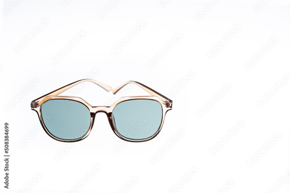 Sunglasses with blue glass on white