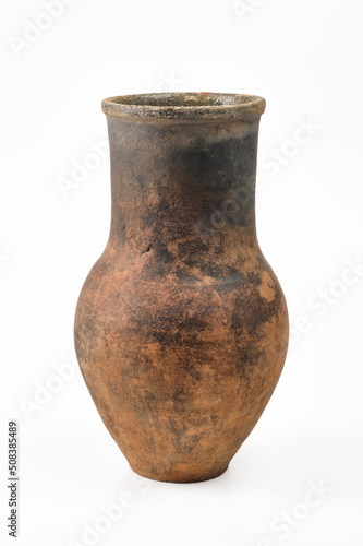 Vintage pottery, vase isolated on white background. Antique brown clay pot on white background.