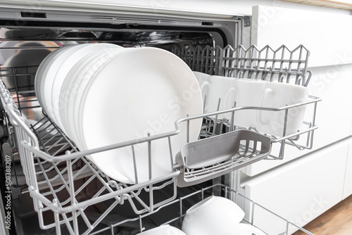 Full load dishwashing machine. Clean dishes and cutlery