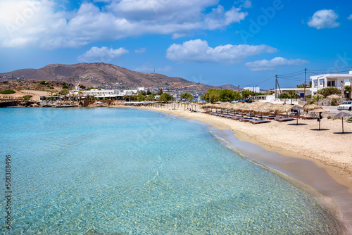 Fototapeta Naklejka Na Ścianę i Meble -  The popular beach at Agathopes, Syros island, Cyclades, Greece, with emerald sea and fine sand