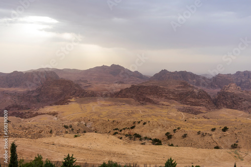 Wadi Musa, Jordan - June 6 2019: The dry and mountainous Jordanian landscape at Wadi Musa