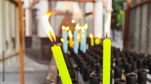 Burning candles at  St. Thomas Cathedral Basilica, Chennai, Tamilnadu, India Present structure dates to 1523 AD, when it was built by Portuguese, over tomb of Thomas Apostle photo