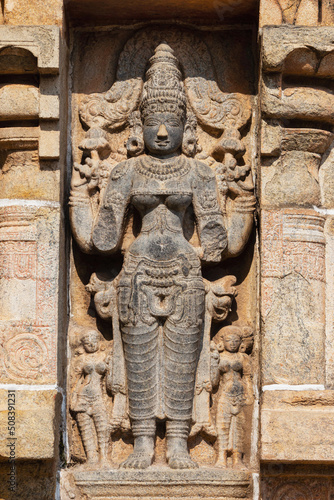 Standing sculpture of Goddess Lakshmi on Gopuram of Nataraja Temple, Chidambaram, Tamilnadu, India