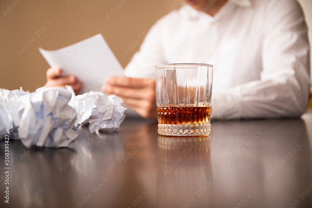 person with glass of whiskey person with glass of whiskey