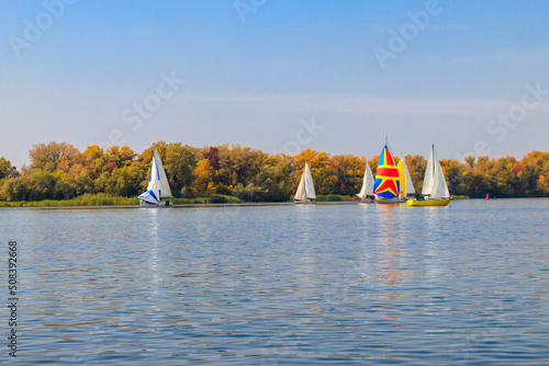 Yachts at sailing regatta on the Dnieper river in Kremenchug, Ukraine