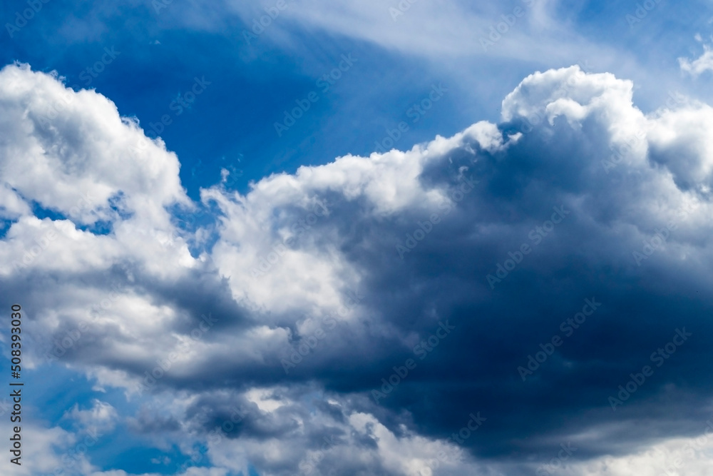 Fototapeta premium thick and relief clouds in the blue sky