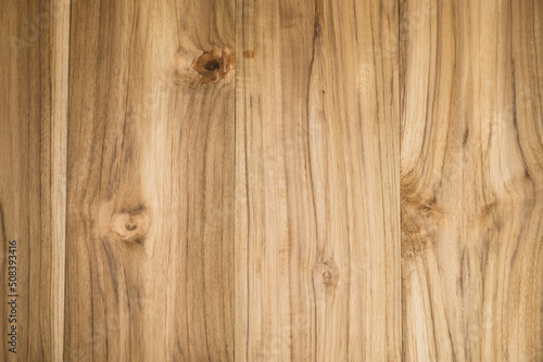 Light brown wood texture surface.