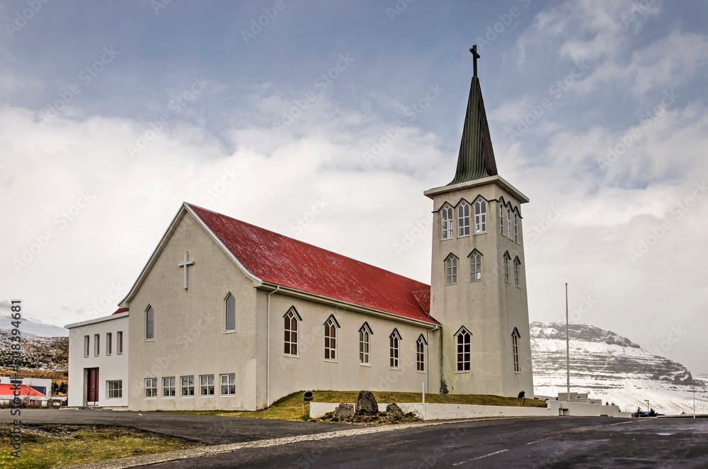 Grundarfjörður, Iceland, May 6, 2022: the town's church on a cloudy day