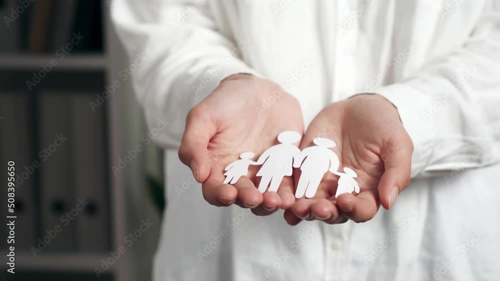 the hands of a young asian woman hold a cut out family from white paper a symbol of family love and well-being, the concept of insurance and insurance medicine of life saving and guarantee
the hands of a young asian woman hold a cut out family from white paper a symbol of family love and well-being, the concept of insurance and insurance medicine of life saving and guarantee